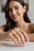Zig Zag Tarnish-Free Gold Ring on white marble