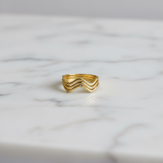 Zig Zag Tarnish-Free Gold Ring on white marble